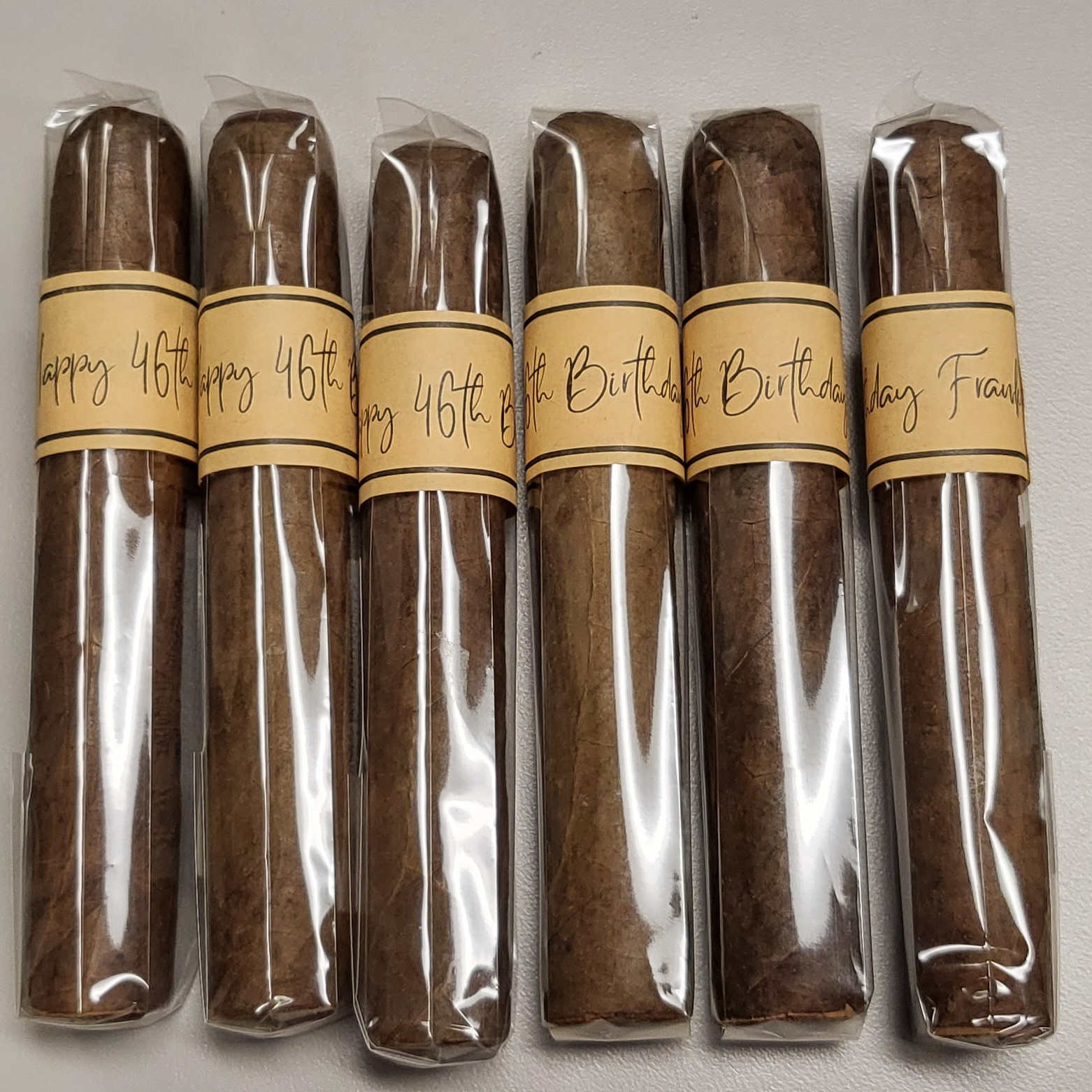 Custom designed cigar labels for a birthday party favor.